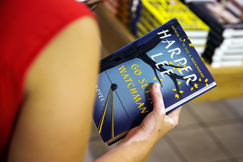 A woman holds a copy of Harper Lee's book "Go Set a Watchman" before purchasing it inside of a Barnes & Noble store in New York, on July 14, 2015. "Go Set a Watchman," the much-anticipated second novel by "To Kill a Mockingbird" author Harper Lee, is the most pre-ordered print title on Amazon.com since the last book in the "Harry Potter" series, Amazon said. Photo courtesy of REUTERS/Lucas Jackson