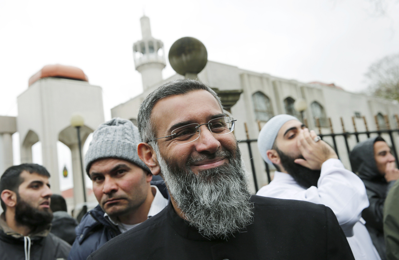 Activist Anjem Choudary leaves London Central Mosque after speaking at a rally calling for British Muslims not to vote as part of the Stay Muslim Don't Vote campaign in London on April 3, 2015. Photo courtesy of REUTERS/Suzanne Plunkett