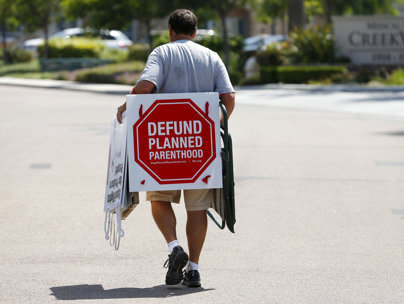 A protester leaves after demonstrating outside a Planned Parenthood clinic in Vista, California, on August 3, 2015. Photo courtesy of REUTERS/Mike Blake
*Editors: This photo may only be republished with RNS-UTAH-PP, originally transmitted on August 17, 2015.