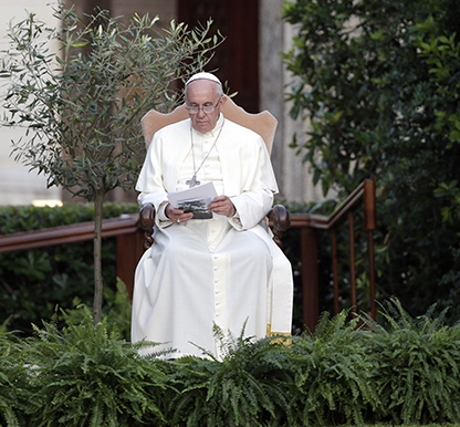 Pope Francis, shown here in the Vatican gardens, is speaking out against deforestation in his native Argentina.  Photo courtesy of REUTERS/Max Rossi