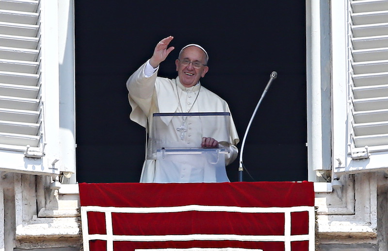 Pope Francis waves as he leads the Angelus prayer from the window of the Apostolic Palace in St. Peter's Square at the Vatican August 9, 2015. Photo courtesy REUTERS/Tony Gentile *Editors: This photo may only be republished with RNS-MILLER-COLUMN, originally transmitted on Sept. 15, 2015.