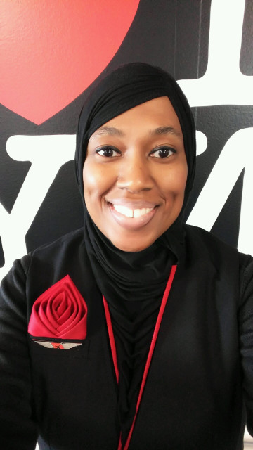 Charee Stanley, a Muslim flight attendant, says ExpressJet suspended her for refusing to serve alcohol, which is against her religious beliefs. Photo: courtesy of CAIR-Michigan, via USA Today