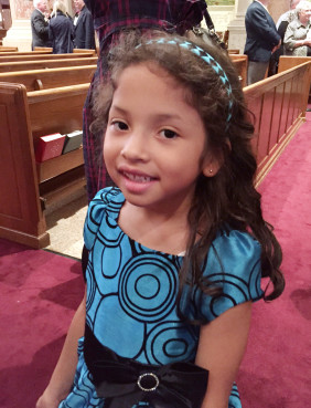 Zoe Cuadra, age 6, came with her mother to hear Pope Francis address the U.S. bishops at St. Matthew's cathedral in Washington on September 23, 2015. Religion News Service photo by Cathy Lynn Grossman