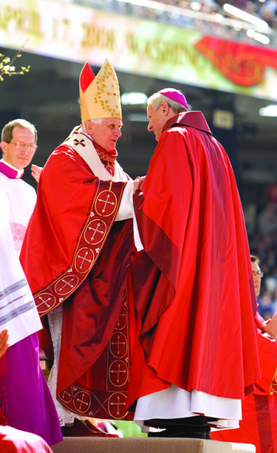 Pope Benedict XVI greets Washington Archbishop Donald Wuerl during the celebration of Mass at Nationals Park on April 17, 2008. Photo courtesy of the Catholic Standard, newspaper of the Archdiocese of Washington
