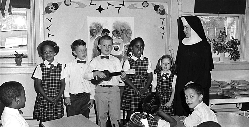 First graders sing the "Our Father" at St. Anthony School in Washington in this 1967 photo. Photo courtesy of the Catholic Standard, newspaper of the Archdiocese of Washington