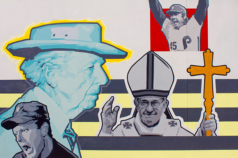A mural includes Pope Francis among other famous 