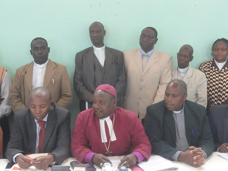 Bishop Joseph Kagunda, center front, and clergy of the Mount Kenya West Diocese during a Sept. 10, 2015 news conference that announced the suspension of priests over alleged gay sex. Religion News Service photo by Fredrick Nzwili