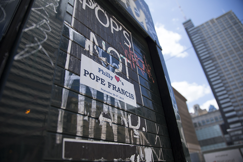 A bumper sticker reads "Philly Loves Pope Francis" in downtown Philadelphia on August 28, 2015, weeks before Pope Francis' visit to the United States. Religion News Service photo by Sally Morrow