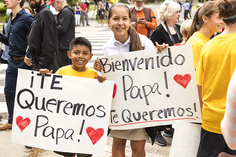Children greet the Pope with signs during his arrival at the Apostolic Nunciature in Washington, D.C. Religion News Service photo courtesy Pete Smith
