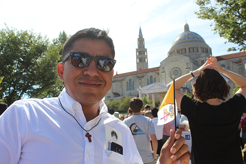 Ricardo Cordova of Springfield, Va., was able to attend Pope Francis’ first Mass in the U.S. on Sept. 23, 2015 after writing a letter to his priest. Religion News Service photo by Adelle M. Banks