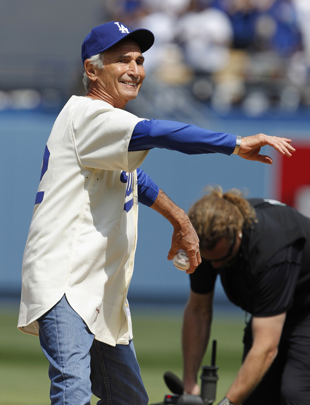 Former Dodger Sandy Koufax pitches the first pitch during pre-game ceremonies before the Dodgers play against the San Francisco Giants in their MLB National League baseball game in Los Angeles, California on April 1, 2013. Photo courtesy of REUTERS/Alex Gallardo *Editors: This photo may only be republished with RNS-SALKIN-COLUMN, originally transmitted on September 22, 2015.