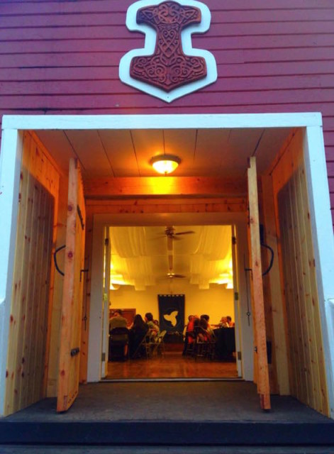 Members of Asatru Folk Assembly consecrate their new “hof” — a worship hall — in Brownsville, Calif. The “mjolnir,” or hammer of Thor hangs above the door. Photo courtesy Tonia Brooks