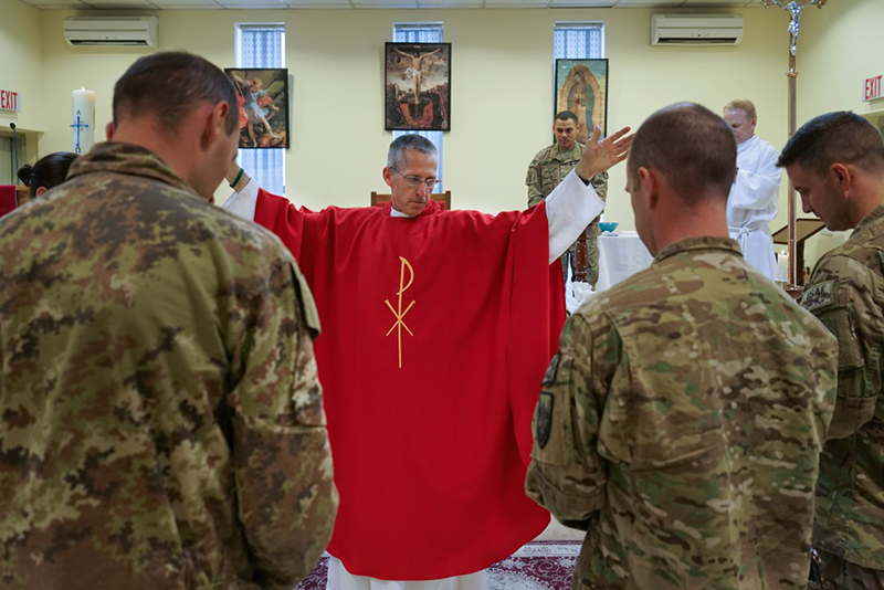 US Army Chaplain Paul Hurley, a Catholic priest, says mass for the troops at a Military base in Kabul, Afghanistan. Photo courtesy of Journey Films