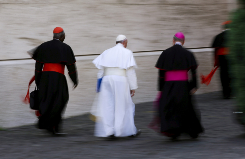 Pope Francis leaves at the end of the morning session of the synod on the family at the Synod hall at the Vatican, on October 15, 2015. Photo courtesy of REUTERS/Max Rossi