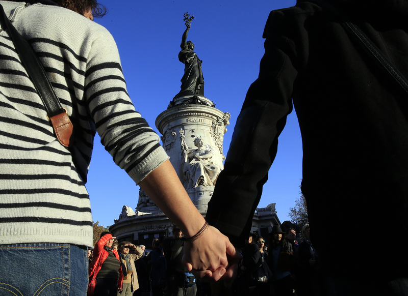 People hold hands to form a human solidarity chain at Place de la Republique near sites of the deadly attacks in Paris, on November 15, 2015. Photo courtesy of REUTERS/Pascal Rossignol
*Editors: This photo may only be republished with RNS-ALMARAYATI-COLUMN, originally transmitted on Nov. 19, 2015.