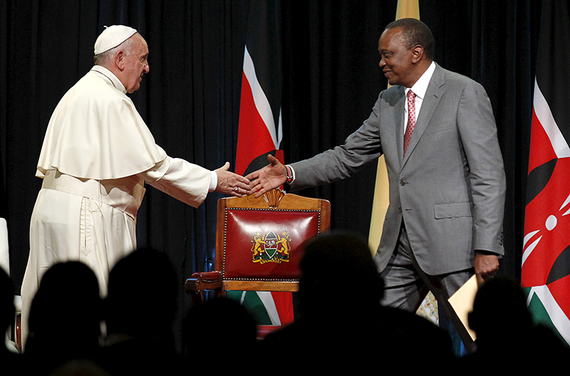 Pope Francis greets his host Kenya's President Uhuru Kenyatta after he delivered his speech during a reception at the State House in Kenya's capital Nairobi, on November 25, 2015. Photo courtesy of REUTERS/Thomas Mukoya
*Editors: This photo may only be republished with RNS-POPE-AFRICA, originally transmitted on Nov. 25, 2015.