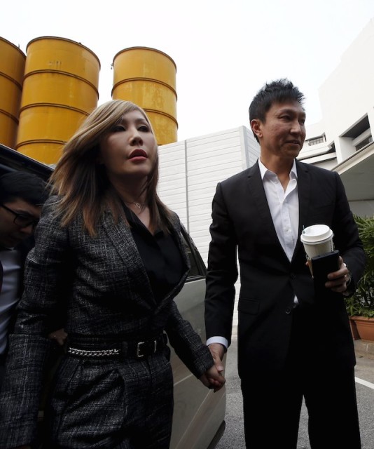 City Harvest Church founder Kong Hee (R) and his wife Sun Ho, also known as Ho Yeow Sun, drew jail terms for stealing millions from his Singapore megachurch. REUTERS/Edgar Su