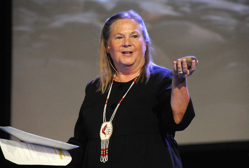Bishop Mary Ann Swenson holding a stone at "An Act of Repentance toward Healing Relationships with Indigenous Peoples" on April 27 at the 2012 United Methodist General Conference in Tampa, Fla. Photo by John C. Goodwin, courtesy of UMNS