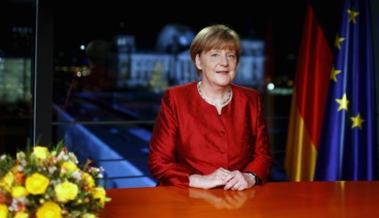 German Chancellor Angela Merkel poses after recording her New Year's speech in the Chancellery in Berlin, Germany, December 30, 2015. REUTERS/Hannibal Hanschke