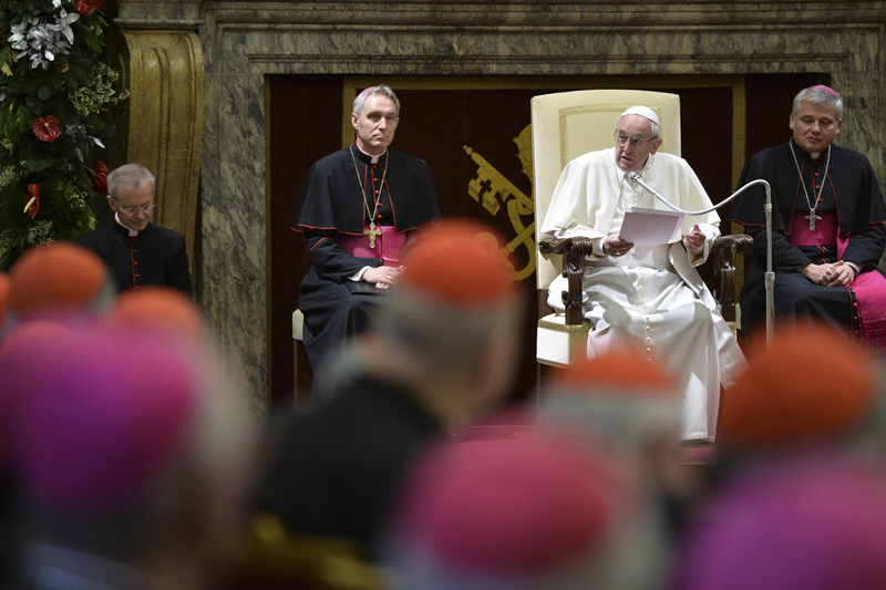 Pope Francis speaks during the traditional greetings to the Roman Curia in the Sala Clementina (Clementine Hall) of the Apostolic Palace, at the Vatican on December 21, 2015. Photo courtesy of REUTERS/Alberto Pizzoli/Pool
*Editors: This photo may only be republished wtih RNS-POPE-CURIA, originally transmitted on Dec. 21, 2015.