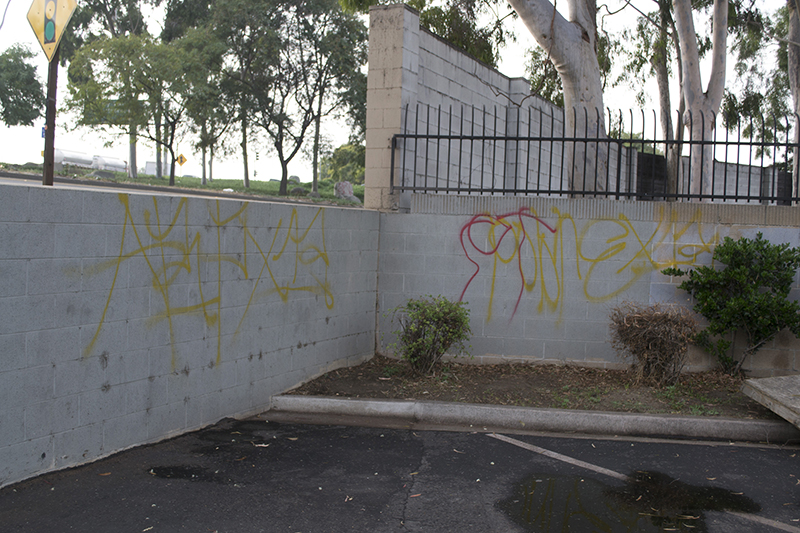 Graffiti is seen on the walls of the parking lot at the Gurdwara Singh Sabha in Buena Park, California on Dec. 10, 2015. The vandalism was first reported on Dec. 6. Religion News Service photo by Katherine Davis-Young