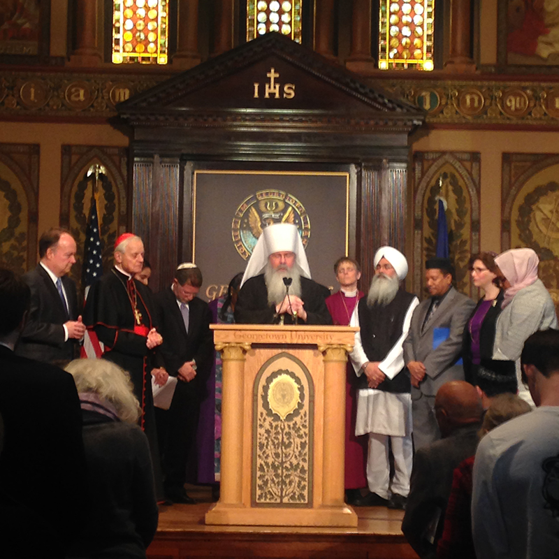 Metropolitan Tikhon of the Orthodox Church in America offers the closing prayer at an interfaith gathering at Georgetown University on December 16. Religion News Service photo by Lilly Fowler