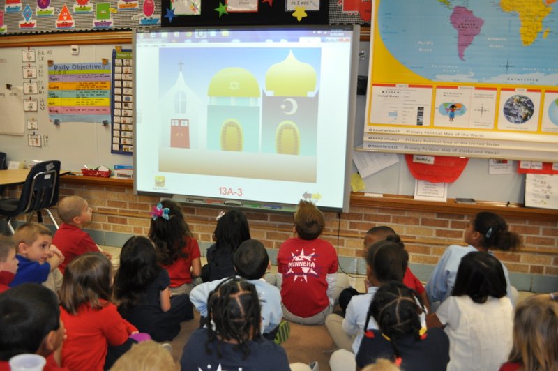 First-graders at Minneha Core Knowledge Elementary School in Wichita, Kan., learn about different houses of worship as part of their school's world religions curriculum, on Nov. 13, 2013. The school, which uses a curriculum founded by education researcher E.D. Hirsch, teaches about the world's religions in several grades as part of social studies. Religion News Service photo by Linda K. Wertheimer