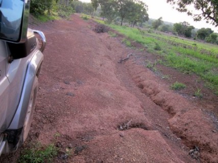The road in southwestern Burkina Faso during the dry season. This was before recent road construction. Source: Karen Conkle.