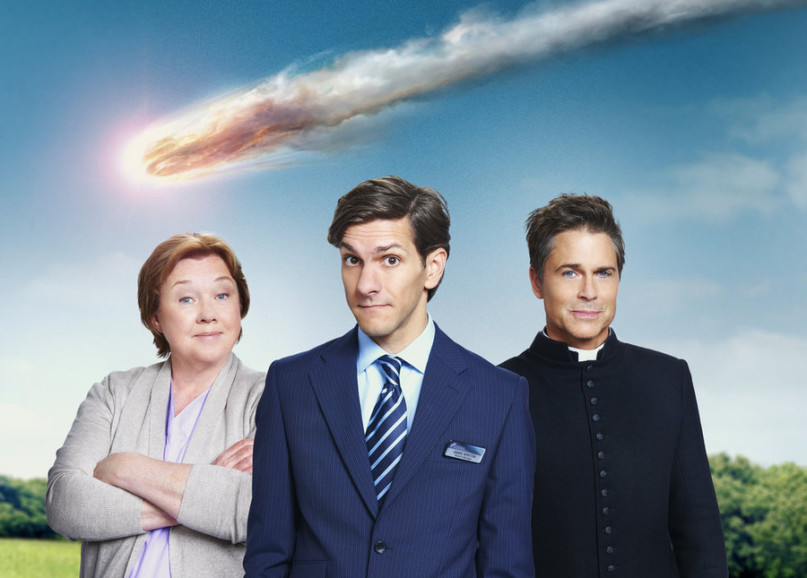 Left to right, Pauline Quirke as Paula Winton, Matthew Baynton as Jamie Winton, and Rob Lowe as Father Jude Sutton in 'You, Me and the Apocalypse.' Photo by Guy Levy/WTTV Productions Limited, courtesy of NBC Universal