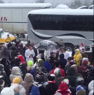 Catholic activists homeward bound from the anti-abortion March for Life in Washington were trapped on an interstate by the weekend blizzard. They built an altar from snow and conducted Catholic Mass. Video posted on Twitter by Abbie Rehurek.
