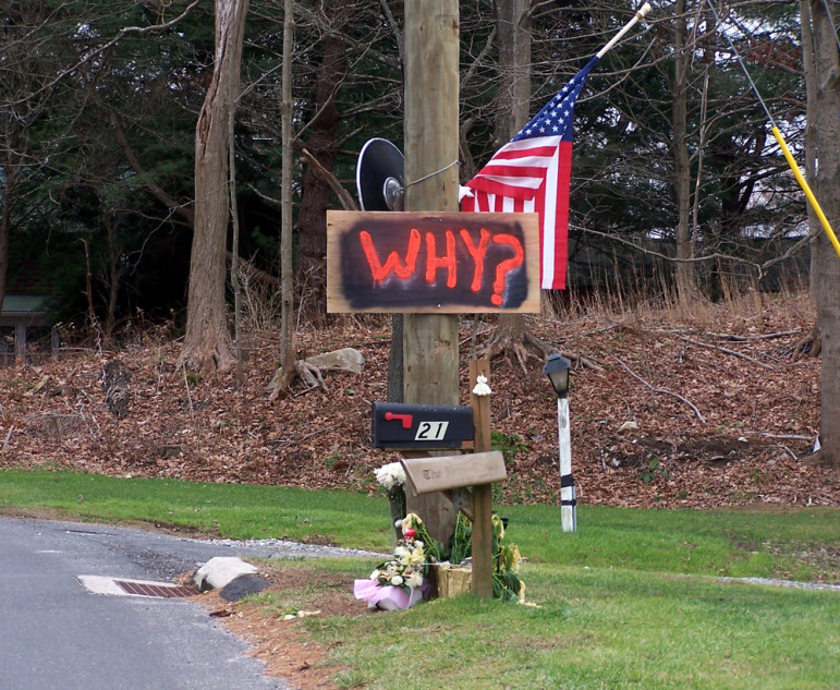 A sign on a tree in Newtown, CT, after the Sandy Hook school shooting. 
Credit: Gina Jacobs, via Shutterstock