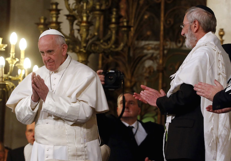 Pope Francis gestures at the end of his visit at Rome's Great Synagogue, Italy January 17, 2016. Photo by Alessandro Bianchi courtesy of Reuters