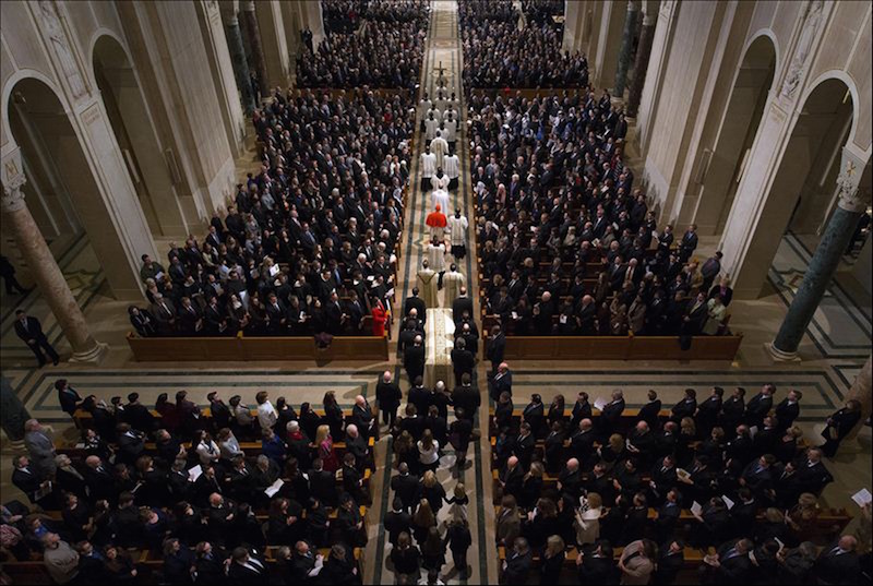 Pallbearers carry the casket down the aisle at the start of the funeral Mass for Associate Justice Antonin Scalia at the Basilica of the National Shrine of the Immaculate Conception in Washington, February 20, 2016.  Photo courtesy of Reuters/Doug Mills/Pool