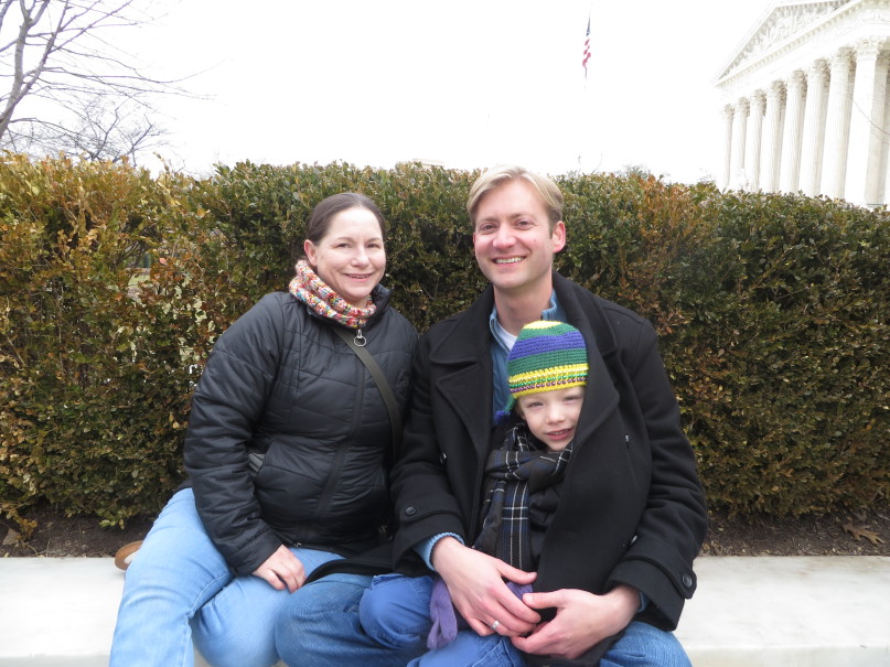 Julie and Jordan Siverd and their son Jacob, 5, drove 21 hours from Mandeville, Louisiana, near New Orleans, and then waited in line outside the Supreme Court in freezing temperatures on Friday (Feb. 19) to pay their respects to Associate Supreme Court Justice Antonin Scalia, who died at 79. Scalia, in an American-flag draped coffin, lay in repose for nine hours in the court’s Great Hall for the public to pay its respects. RNS Photo by Lauren Markoe.