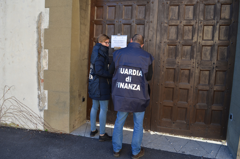 This photo was released by Italy's financial police earlier in the operation when they arrested the priest Patrizio Benvenut. Photo courtesy of Guardia di Finanza