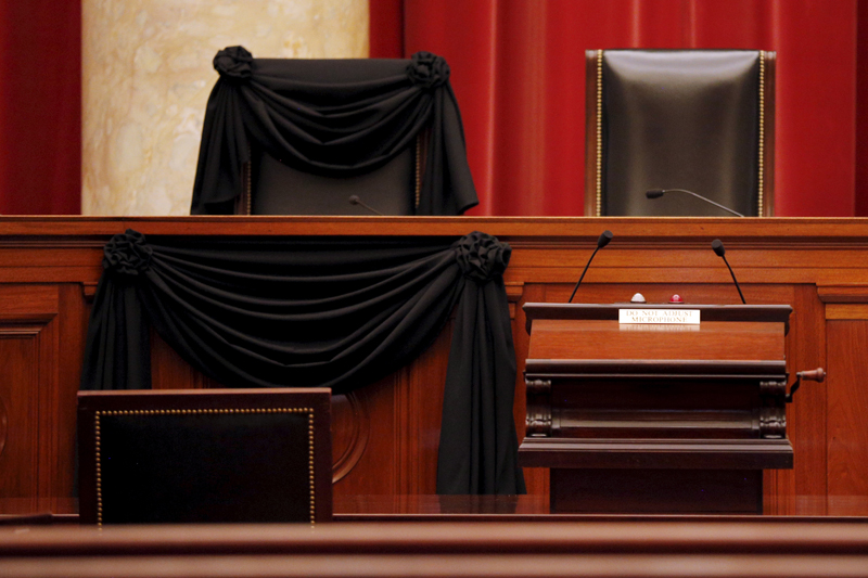 The bench of late Supreme Court Justice Antonin Scalia is seen draped with black wool crepe in memoriam inside the Supreme Court in Washington, on February 16, 2016. Photo courtesy of REUTERS/Carlos Barria *Editors: This photo may only be republished with RNS-MILLER-COLUMN, originally transmitted on Feb. 18, 2016.