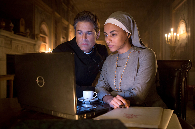 Rob Lowe as Father Jude Sutton, and Gaia Scodellaro as Sister Celine Leonti in 'You, Me and the Apocalypse." Photo by Ed Miller/WTTV Productions Limited