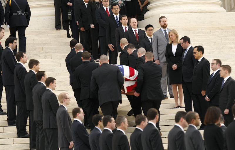 The casket of late U.S. Supreme Court Justice Antonin Scalia arrives at the Supreme Court, where Scalia's body will lie in repose in the court's Great Hall in Washington on February 19, 2016, a day before his funeral service. Scalia died on February 13, 2016 at the age of 79. REUTERS/Gary Cameron