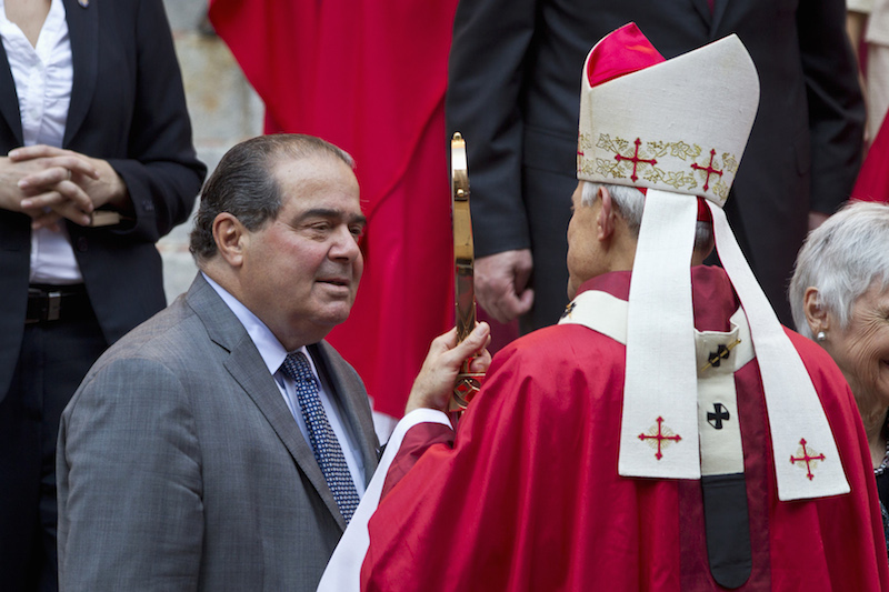 Associate Justice of the U.S. Supreme Court Antonin Scalia talks with Archbishop of Washington, Cardinal Donald Wuerl at the conclusion of the annual Red Mass held at the Cathedral of St. Matthew the Apostle in Washington, on September 30, 2012. Photo courtesy of REUTERS/Benjamin Myers   
*Editors: This photo may only be republished with RNS-MILLER-COLUMN, originally transmitted on Feb. 18, 2016.