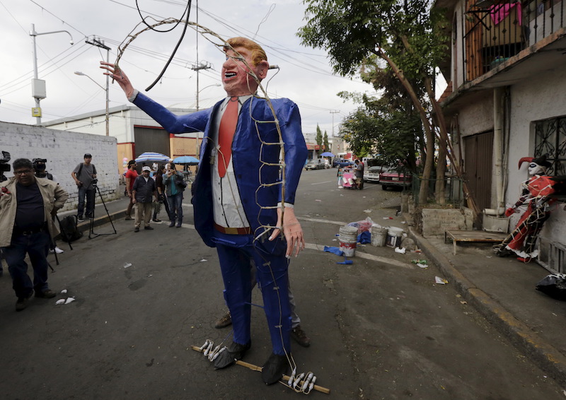 An effigy of Republican presidential hopeful Donald Trump is seen outside at a workshop before it was burned during an Easter ritual late on Saturday in Mexico City's poor La Merced neighborhood March 26, 2016. Photo courtesy REUTERS/Henry Romero 