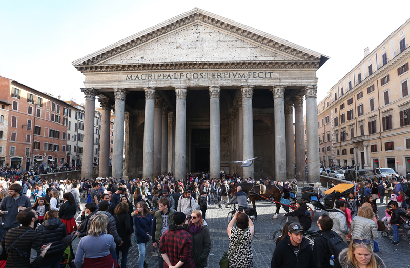 People stroll in front of the Pantheon's ancient temple downtown in Rome, Italy, on March 27. 2016. Photo courtesy of REUTERS/Stefano Rellandini 
*Editors: This photo may only be republished with RNS-ITALY-CATHOLIC, originally transmitted on March 29, 2016.