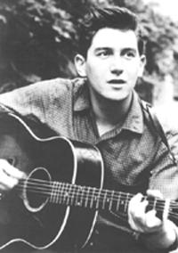 Phil Ochs in the early 1960s. Credit: Wikipedia.