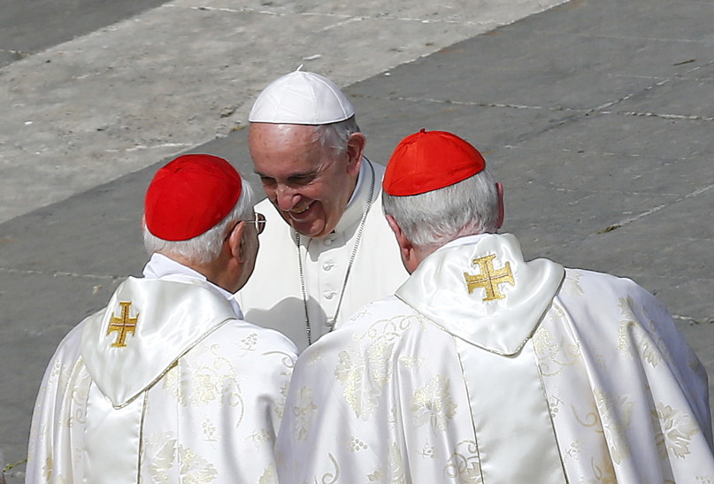 Pope Francis greets cardinals at the end of a Jubilee mass in Saint Peter's Square at the Vatican, April 3, 2016. REUTERS/Tony Gentile.