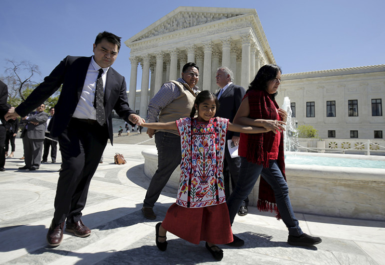 Sophie Cruz, 6, walks with her father, Raul Cruz, left, after arguments in a challenge by 26 states over the constitutionality of President Barack Obama's executive action to defer deportation of certain immigrant children and parents who are in the country illegally at the Supreme Court in Washington, U.S., on April 18, 2016. Photo courtesy of REUTERS/Joshua Roberts
*Editors: This photo may only be republished with RNS-KARGE-COLUMN, originally transmitted on April 20, 2016.