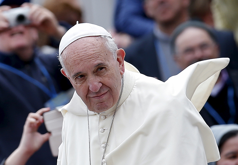 Pope Francis arrives at the weekly audience in Saint Peter's Square at the Vatican, on April 27, 2016. Photo courtesy of REUTERS/Alessandro Bianchi *Editors: This photo may only be republished with RNS-SKULLCAP-AUCTION, originally transmitted on April 27, 2016.