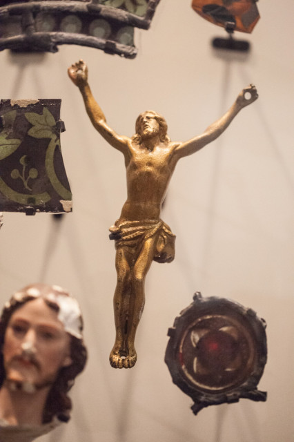This statue of Jesus crucified is included in a collection of the fragments from Reims Cathedral in France, on display at the National WWI Museum at Liberty Memorial in Kansas City, Mo., on May 2, 2014. The museum holds the most diverse collection of artifacts around the world. Religion News Service photo by Sally Morrow