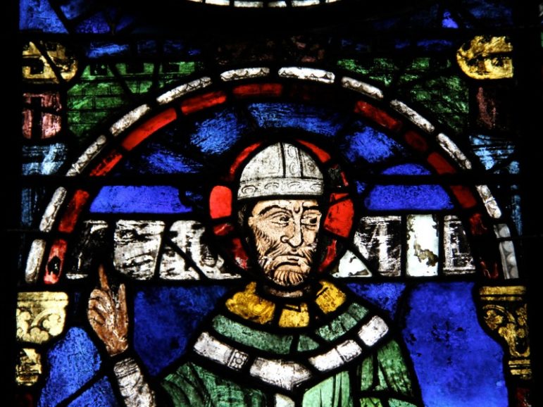 St Thomas Becket looks down from Canterbury cathedral’s window. (Photo has been cropped from the original.) Photo courtesy of Renaud Camus/Flickr