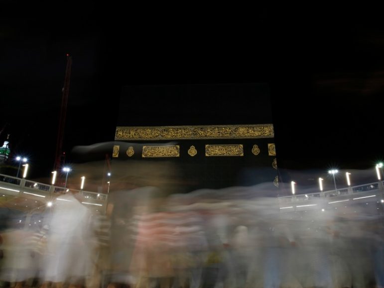 Muslim pilgrims circle the Kaaba and pray during their Umrah Mawlid al-Nabawi 
