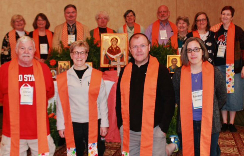 Clergy from the Episcopal Diocese of Ohio wear orange stoles ahead of Wear Orange Sunday
