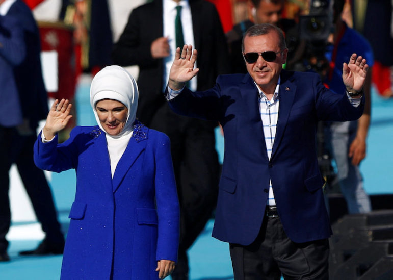 Turkish President Tayyip Erdogan, accompanied by his wife, Emine Erdogan, greets supporters during a rally to mark the 563rd anniversary of the conquest of the city by Ottoman Turks, in Istanbul, Turkey, May 29, 2016. Photo courtesy of Reuters/Murad Sezer